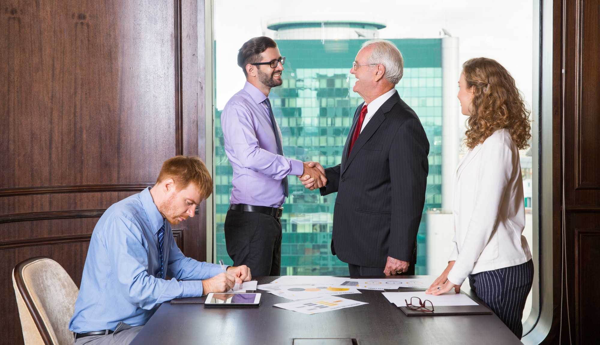 CEO shaking hands with Group Insurance Professional